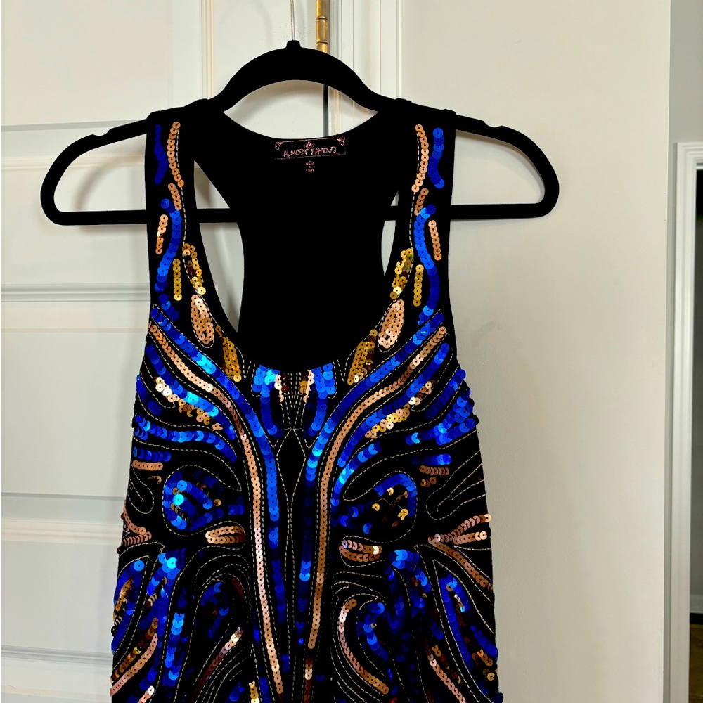 Large Black dressy cotton tank with sequins on front. Brand new